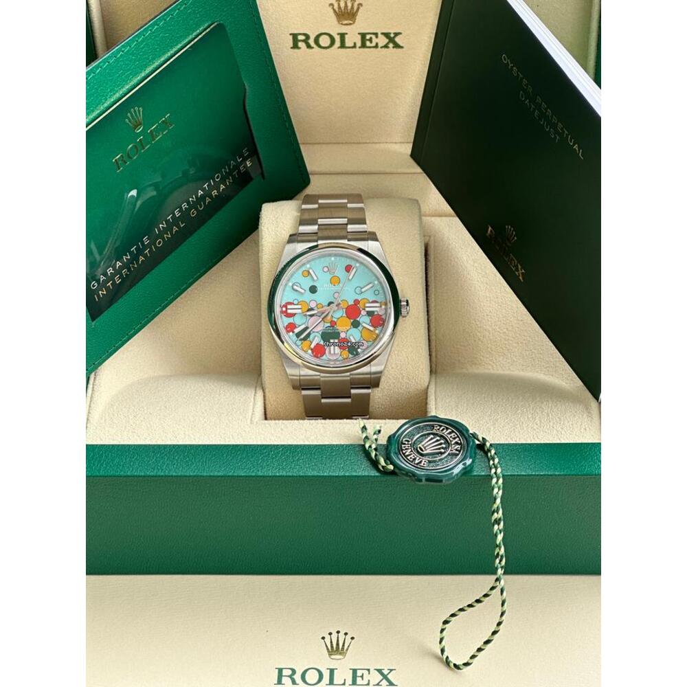 Rolex Oyster Perpetual 41mm 124300 Oystersteel Celebration Motif Turquoise Blue Dial